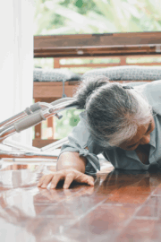 Senior woman working on balance during fall prevention physical therapy