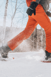 Family snowshoeing on a trail in Freeport