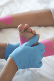 Physical therapist assessing an athlete’s movement to prevent injury at Reform Physical Therapy.