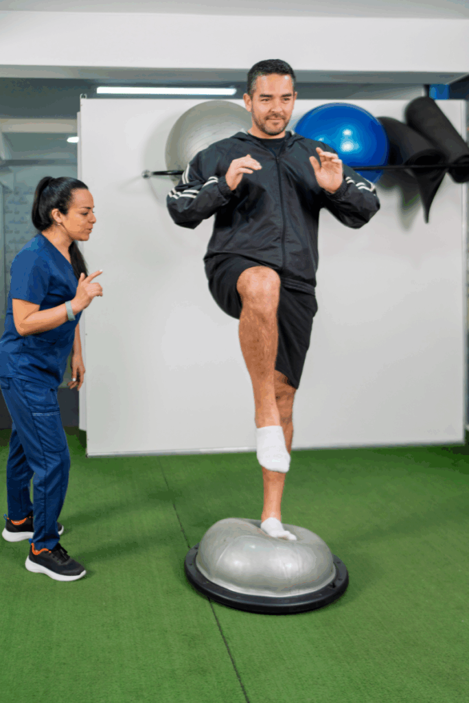 Physical therapist providing one-on-one support and home exercise guidance.