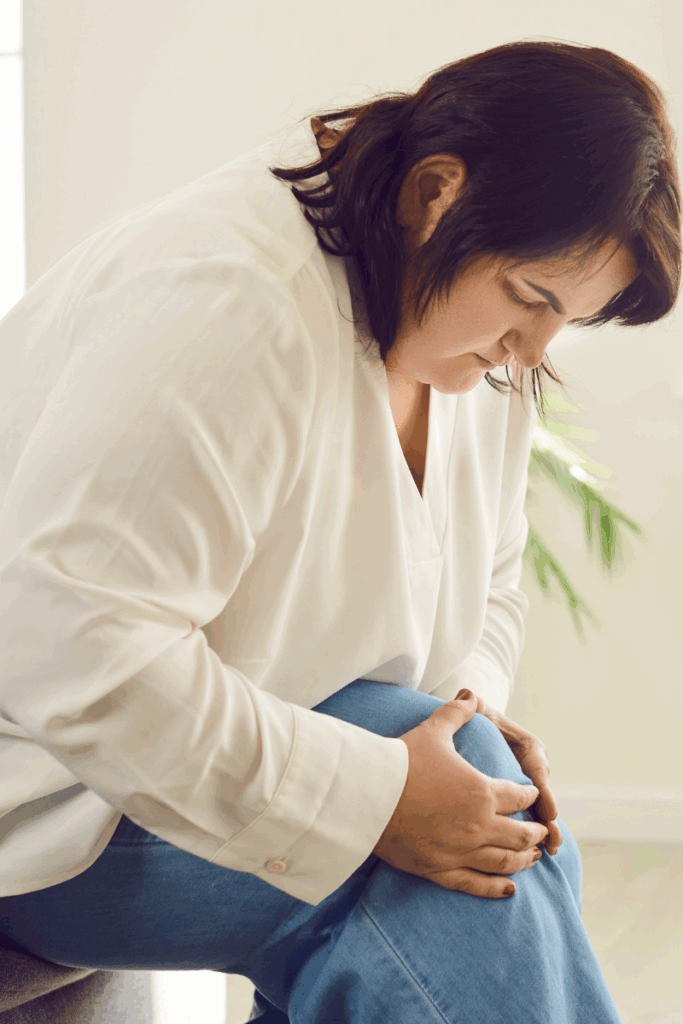 Infographic comparing normal soreness to harmful pain.