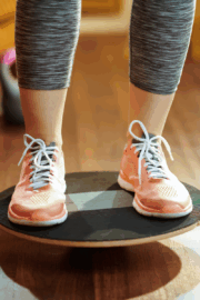 Athlete balancing on one leg during training