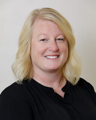Headshot of Jill Partridge, corporate team Reform Physical Therapy