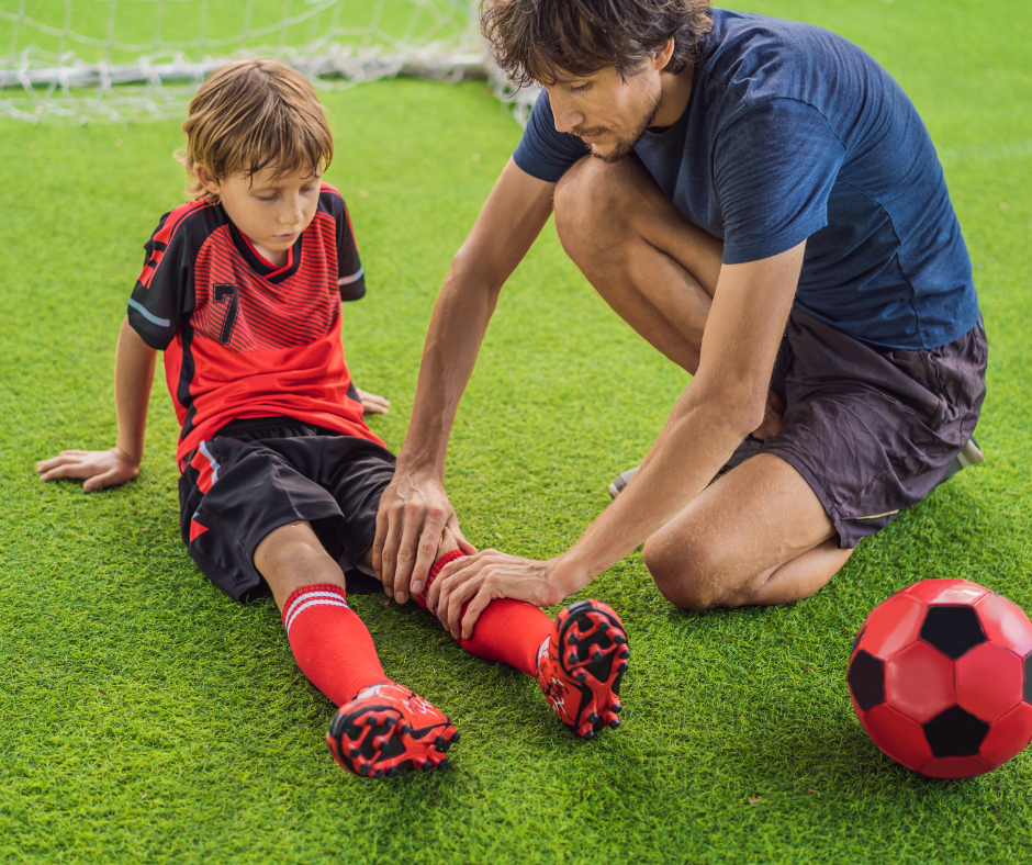 PT guiding athlete through balance drill