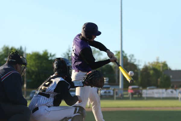 Baseball and softball player receiving physical therapy in Southern Maine clinic